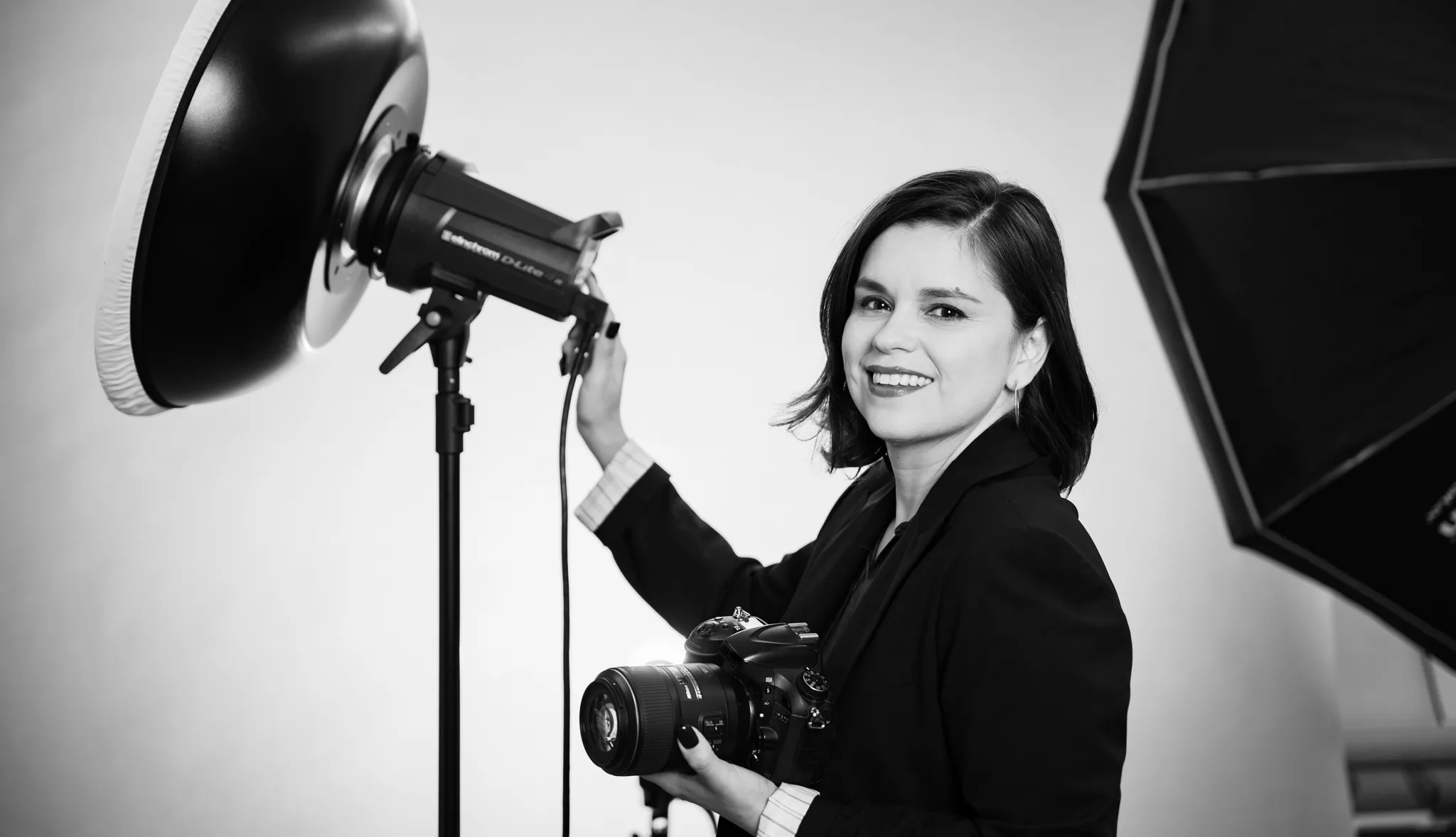 Lucero working with studio lighting and camera equipment