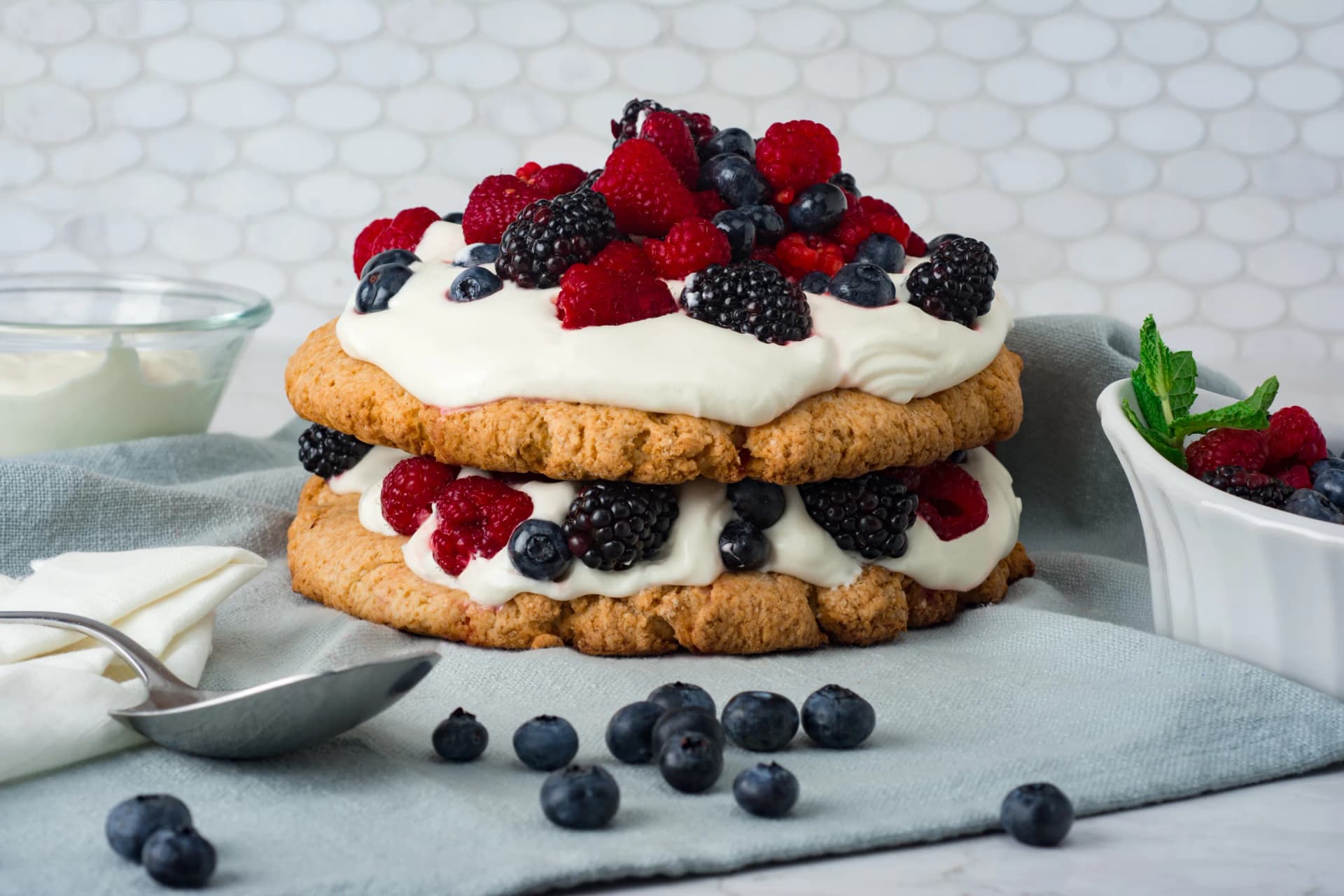 Styled product photography with food and fresh berries